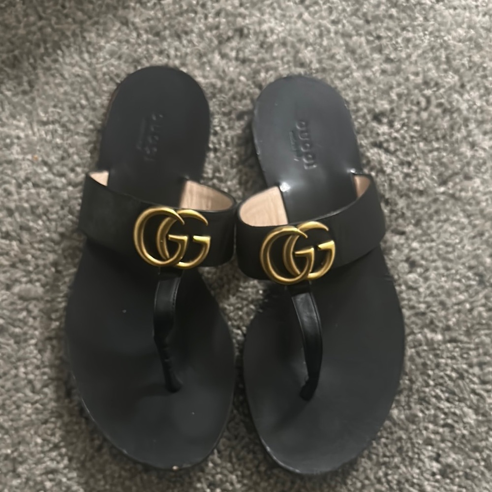 Gucci Black Slides with Gold Emblem